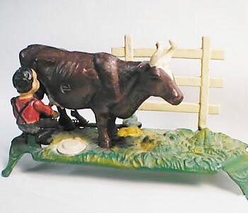 Book of Knowledge Milking Cow Mechanical Bank