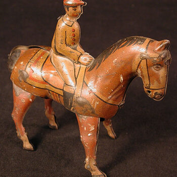 Keim & Co. Horse & Jockey Tin Windup
