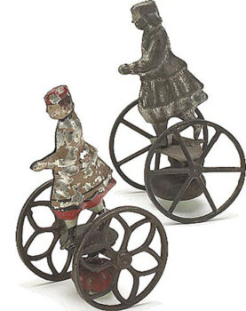 George Brown Balancing Girl Toys painted Ladies on Wheels