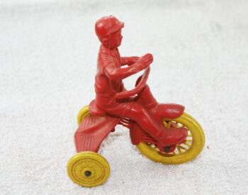 Auburn Rubber Boy on Tricycle
