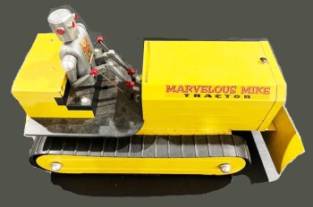 Saunders Toy Co. Marvelous Mike Robot Driving a Tractor