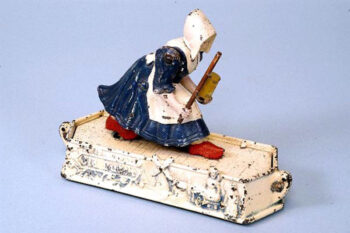 Hubley Dutch Cleanser Girl Chasing Dirt Toy